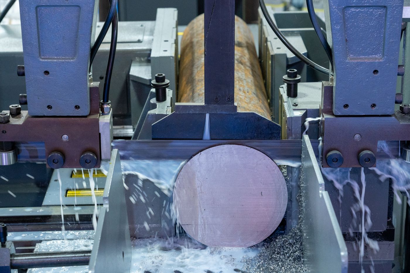 Steel bar being cut to length on the plant floor